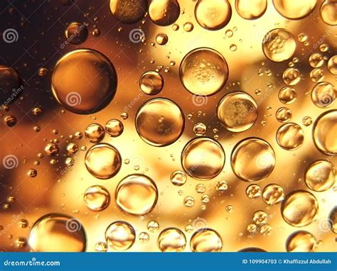 Mix of Water and Oil Macro Art Stock Image - Image of golden, bubbles ...