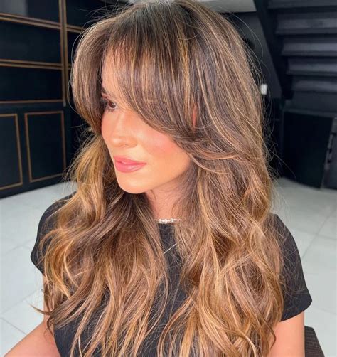 Layered Hairstyles with Curtain Bangs | mcIntyres Salons