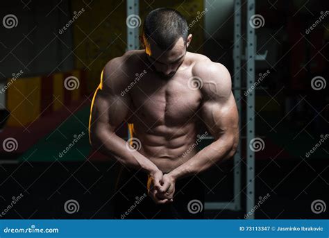 Handsome Body Builder Making Most Muscular Pose Stock Image - Image of ...