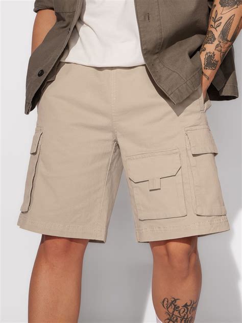 Buy Solids: Beige Men Cargo Shorts Online