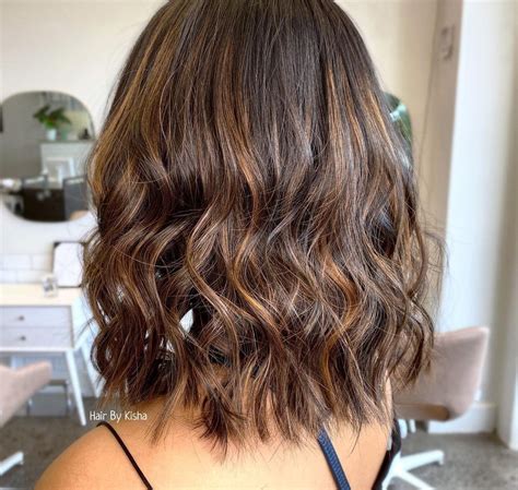 35 Fun & Easy Medium-Length Hair Styles to Try in 2021