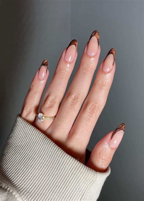 27+ Brown Nails That Are Anything But Basic - marble, swirls, etc.