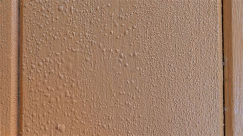 How to fix paint bubbles on walls