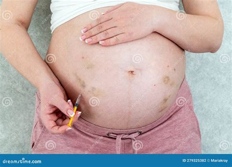 Blood Thinners Concept. Pregnant Woman Making Injection in Stomach Stock Photo - Image of ...
