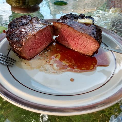 Filet mignon. Reverse sear method, Lodge #5 cast iron skillet. Cheers ...