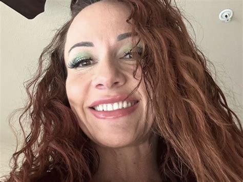 Luci Power: It's all in the smile for the red head vixen — Attack The Culture