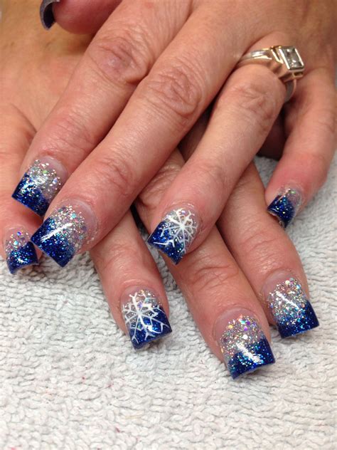 Snowflake nails | Blue and silver nails, Blue christmas nails, Winter ...