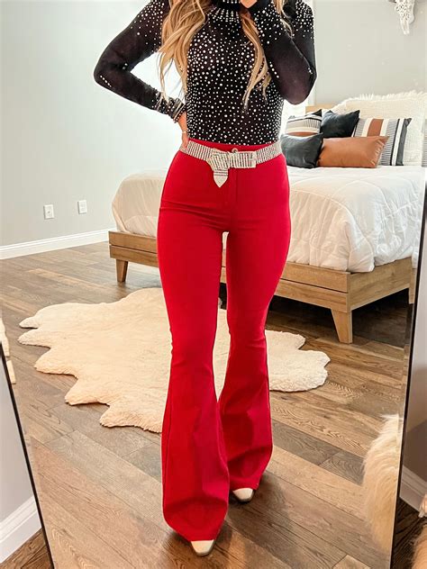 Fiery Red Flares Model Wearing size small. Runs true to size 76% Cotton ...