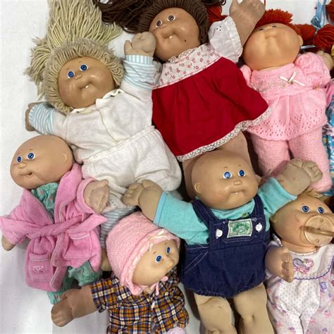 Lot of 9 Vintage Cabbage Patch Kids Dolls (s)