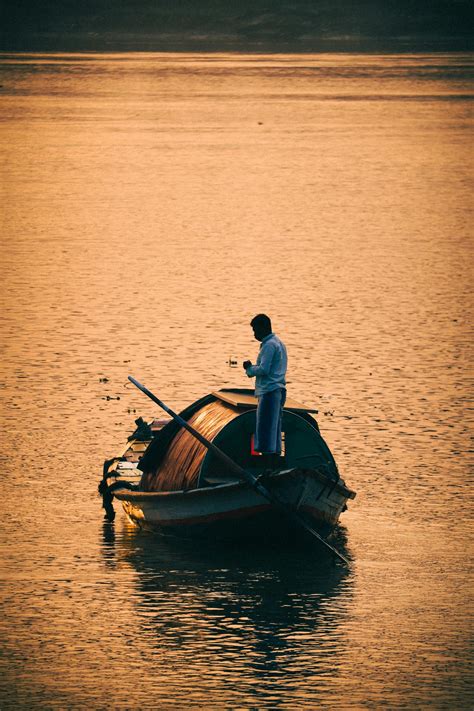 Man With Boat Photos, Download The BEST Free Man With Boat Stock Photos & HD Images
