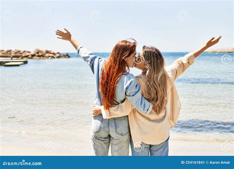 Young Lesbian Couple of Two Women in Love at the Beach Stock Image - Image of beach, happiness ...