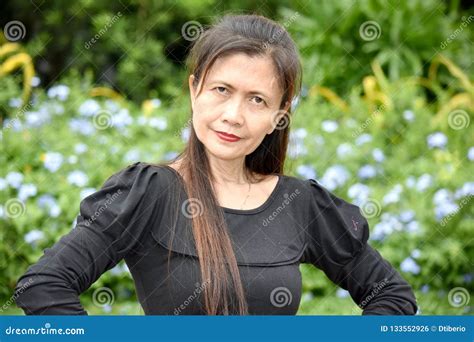 Serious Filipina Female Senior Stock Photo - Image of older, female: 133552926