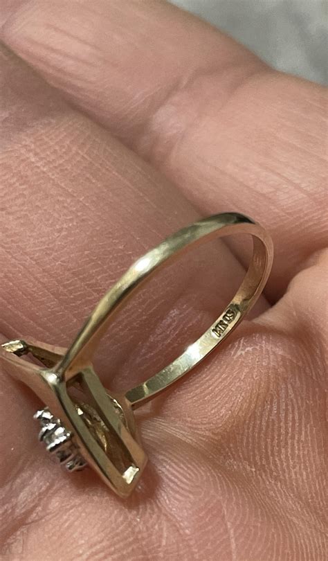 I found my first ring!!! What does 14k 03 stamp mean? : r/metaldetecting