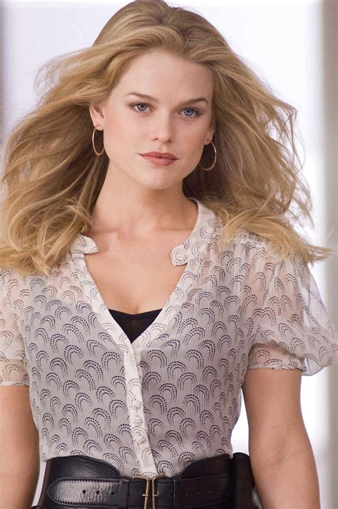 Download Stunning Alice Eve posing for a magazine photoshoot. Wallpaper | Wallpapers.com