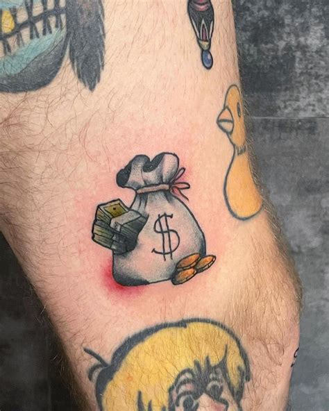 30+ Money Tattoo Design Ideas To Send The Right Message | Money tattoo ...