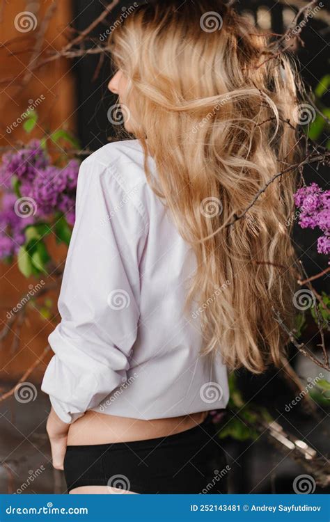 View Back. Blonde with Bare Breasts in a White Shirt with Lilac Branches. Stock Image - Image of ...