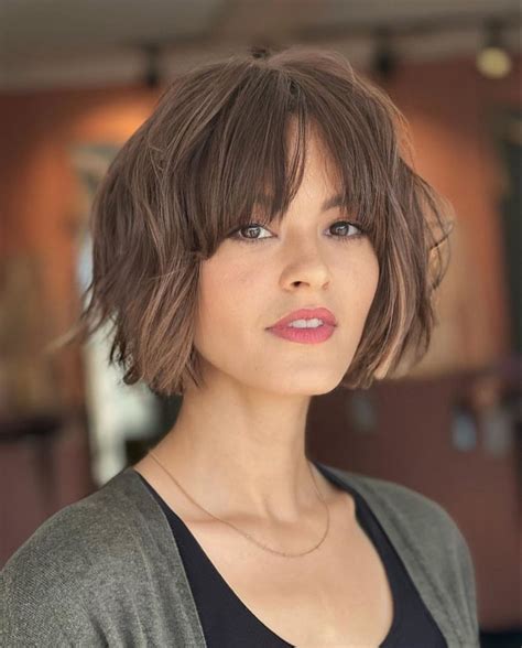 11 Chin-Length Haircuts With Bangs For A Chic And Flattering Look