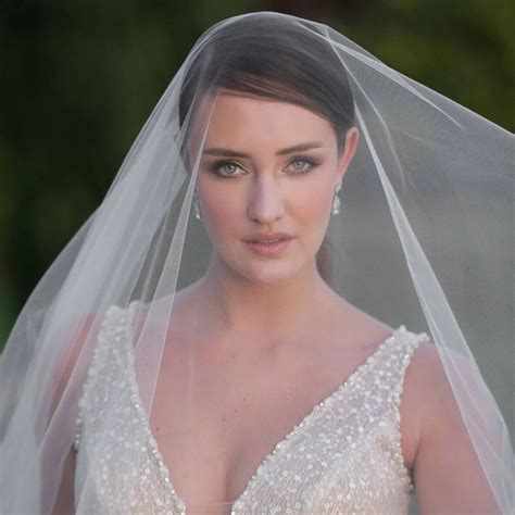 Elegance Unveiled: Two-Tier Cathedral Bridal Veil with Long Blusher ...