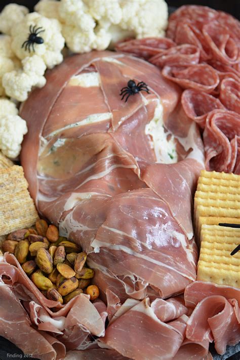 Spooky Charcuterie Board with Skull Cheese Ball - Finding Zest