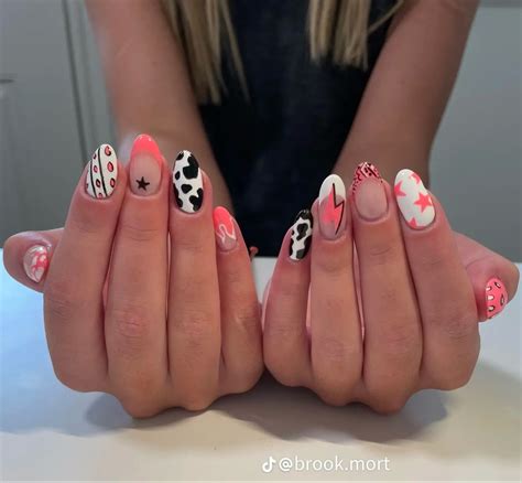 Pink and cow print nails | Cowboy nails, Country acrylic nails, Cow nails