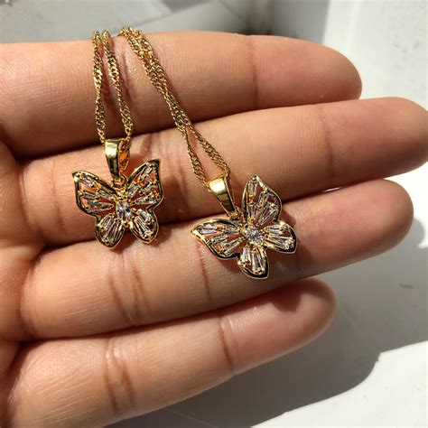 Butterfly Pendant Gold Crystals at Harrison Trethowan blog