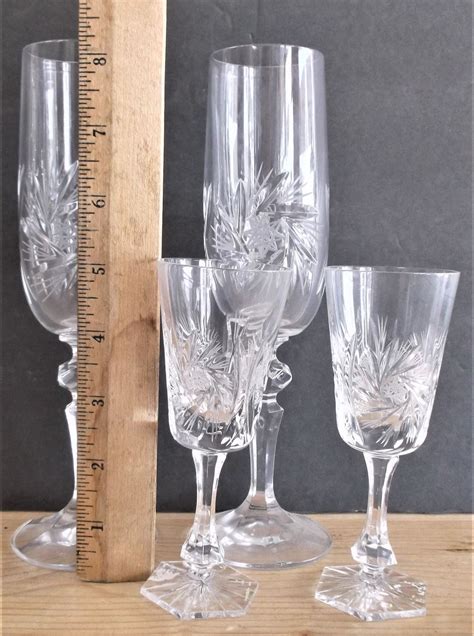 Pinwheel Lead Crystal - Two Champagne Flutes and Two Sherry Glasses
