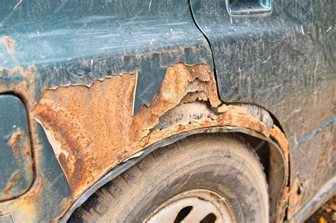 Premium Photo | Fragment of an old damaged and rusted car