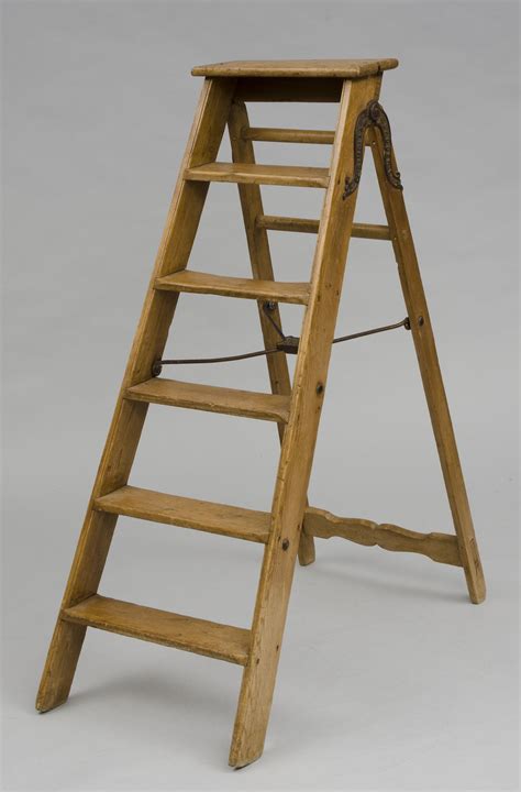 Antique English Victorian pine step ladder with six steps. Metal label ...