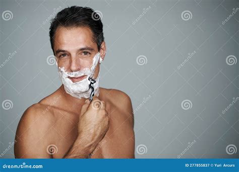 Starting the Day with a Shave. Studio Portrait of a Handsome Mature Man Shaving His Face. Stock ...