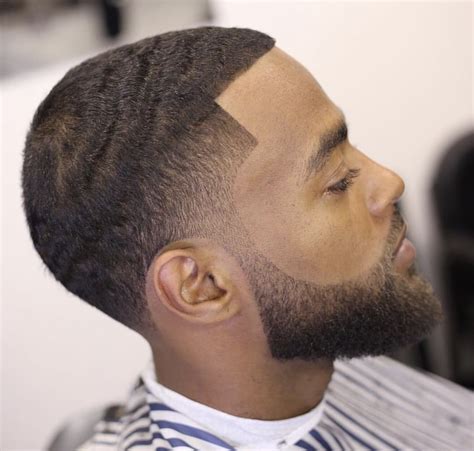 Taper fade | Black men haircuts, Mens haircuts fade, Black men beard styles