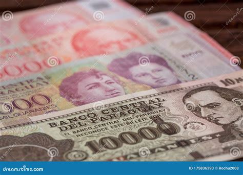 Paraguay Money, Guaranies Banknotes Stock Image - Image of cash, hand: 175836393