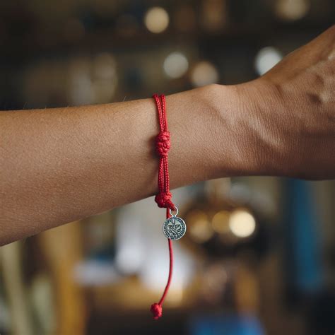 Red String Bracelets: Their Significance in Different Cultures and ...