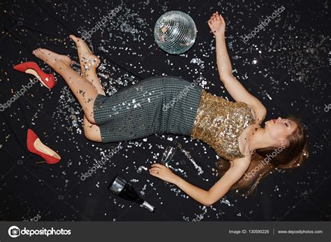 Drunk girl sleeping on the dance floor — Stock Photo © pressmaster ...
