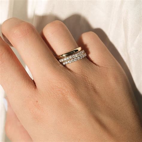 Yellow gold diamond eternity rings - the cutest stacking rings - Holts ...