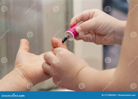 Children Paint Each Other S Nails with Baby Nail Polish. Children S ...