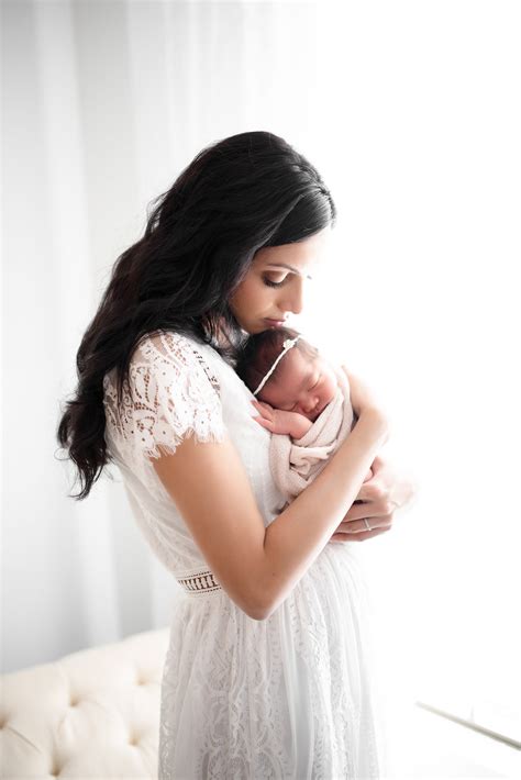 Mother And Newborn Baby Photography