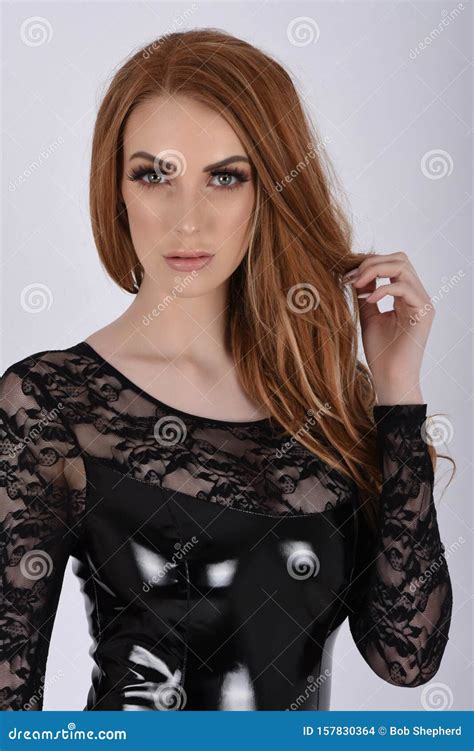 Sexy, Busty Redhead in Short, Tight Latex Dresses Stock Photo - Image ...