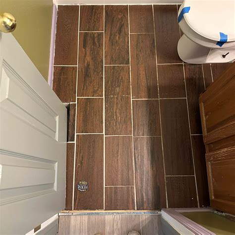 How to Remove Floor Tile In An Upstairs Bathroom | DIY