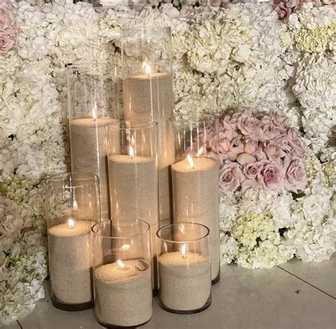 Pearl candle and sand centerpieces