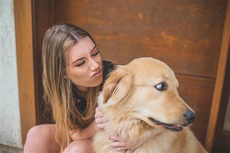 Woman Holding Dog · Free Stock Photo