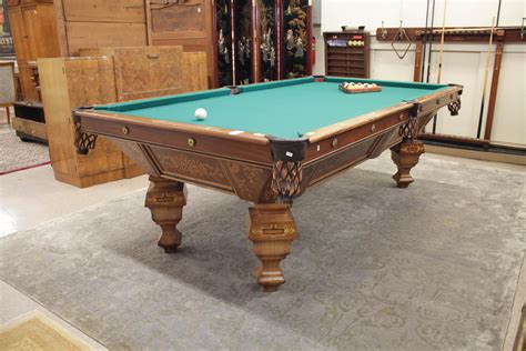 Lot - ANTIQUE BRUNSWICK POOL TABLE