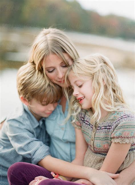 Happy mother and children playing outside stock photo 38216580 – Artofit