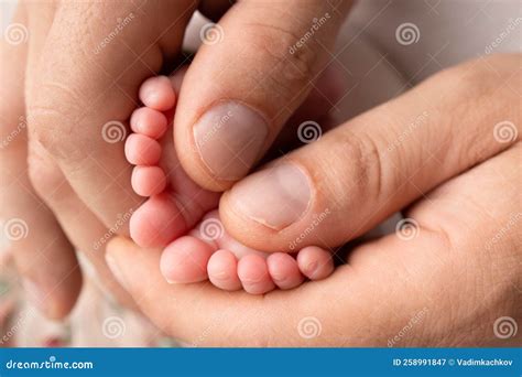 Mother and Father are Doing Massage on Her Baby Foot. Prevention of Flat Feet, Development ...