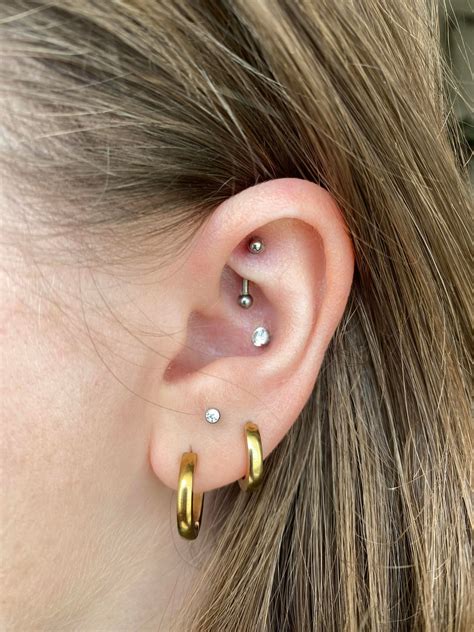 with this 3rd stacked lobe, i think i’m finally done :-) : r/piercing