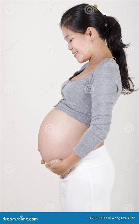 Asian pregnant woman stock image. Image of holding, asian - 20986077