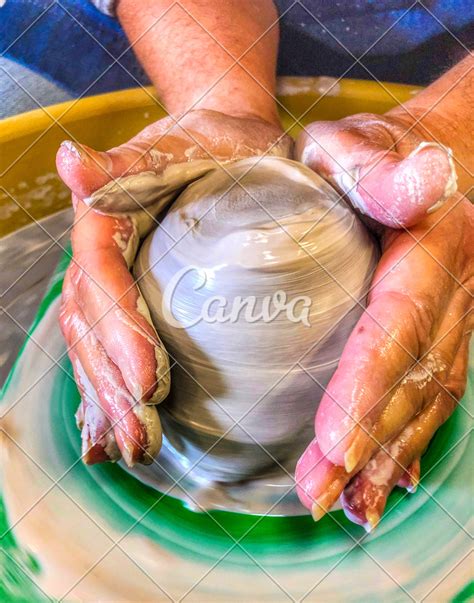 Woman's Hands Molding Clay on a Potter's Wheel - Photos by Canva