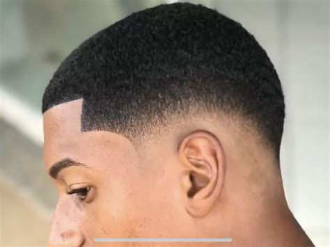 Black men's waves haircut with low taper fade | Black hair cuts, Black ...