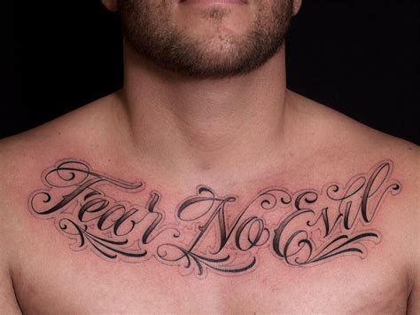 Pin by yzan tattoo on Tattoos in 2025 | Chest tattoo text, Word tattoos ...