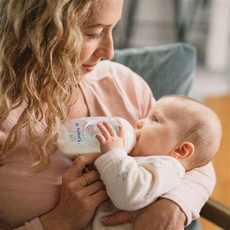 How to Hold a Baby While Bottle Feeding - Dr Talbot's