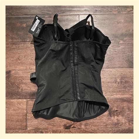 Spirit Halloween Black Corset Top. NWT never worn.... - Depop